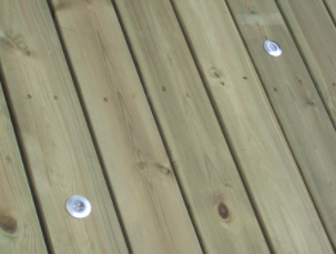 A wood deck that was pressure washed so well it looks brand new again now that it's dry.